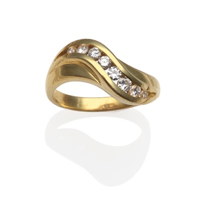 Lot 2054 - An 18 Carat Gold Diamond Twist Half Hoop Ring, with graduated brilliant cut diamonds in a wavy...