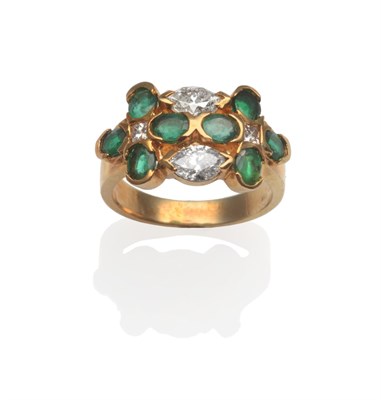 Lot 2070 - An Emerald and Diamond Cluster Ring, eight oval cut emeralds with two marquise cut diamonds and two