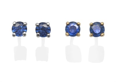 Lot 2079 - Two Pairs of Sapphire Stud Earrings, the round cut sapphires, one pair in white claw settings,...