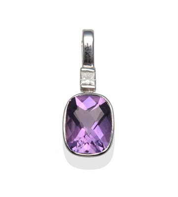 Lot 2087 - A 9 Carat White Gold Amethyst and Diamond Pendant, a rose cut amethyst in a white rubbed over...