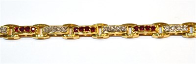 Lot 2091 - A Ruby and Diamond Bracelet, yellow bar links set with round brilliant cut diamonds and round...