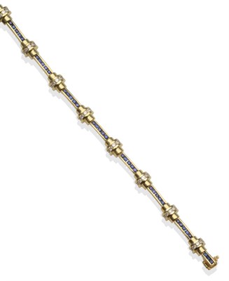 Lot 2094 - A Sapphire and Diamond Bracelet, with round brilliant cut diamonds in yellow channel settings...