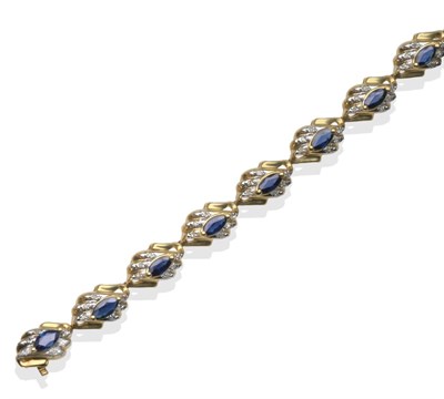 Lot 2098 - A Sapphire and Diamond Bracelet, articulated wave links set with marquise cut sapphires and...