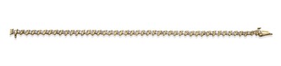 Lot 2099 - A Diamond Bracelet, the eight-cut diamonds in white claw and illusion settings, spaced with...