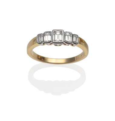 Lot 2105 - An 18 Carat Gold Diamond Five Stone Ring, emerald-cut diamonds in white rubbed over settings,...