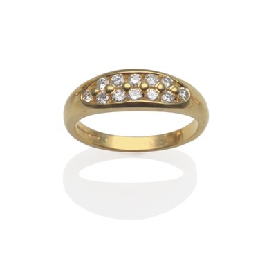 Lot 2106 - An 18 Carat Gold Diamond Two Row Ring, round brilliant cut diamonds in a yellow claw and...