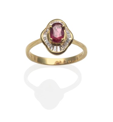 Lot 2124 - A Ruby and Diamond Ring, an oval cut ruby in a yellow claw setting, with channel set borders of...