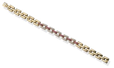 Lot 2126 - A Ruby and Diamond Bracelet, of brick link form, the centre link with channel set step cut...