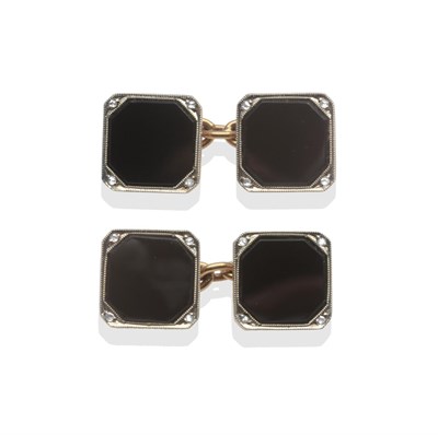 Lot 2137 - A Pair of Onyx and Diamond Cufflinks, four octagonal onyx in white milled frames with rose cut...