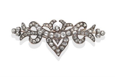 Lot 2151 - A Diamond Set Brooch, of scroll form, set with old cut diamonds in claw settings, total...