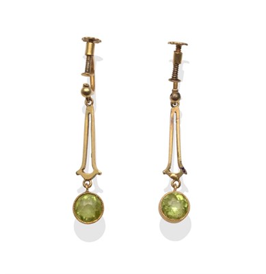 Lot 2161 - A Pair of Peridot Earrings, each with a round cut peridot in yellow rubbed over settings, suspended