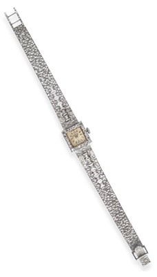 Lot 2188 - A Lady's 18ct White Gold Diamond Set Wristwatch, signed Marvin, 1965, lever movement, silvered dial