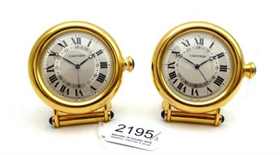 Lot 2195 - Two Alarm Travelling Timepieces, signed Cartier, circa 2010, quartz movement, two toned...