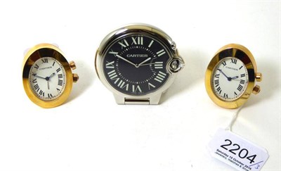 Lot 2204 - Three Alarm Travelling Timepieces, signed Cartier, circa 2010, the first, quartz movement,...