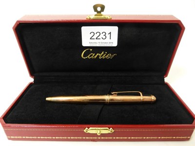 Lot 2231 - Cartier: A Mini Diabolo de Cartier Ballpoint Pen CRST180134, in original presentation case,...