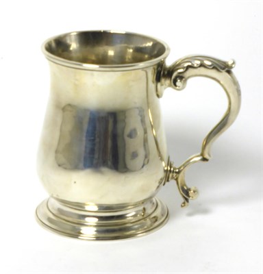 Lot 2254 - A George III Silver Mug, William & James Priest, London 1767, of baluster form with an acanthus...