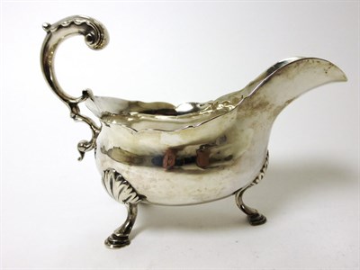 Lot 2258 - A George III Silver Sauce Boat, William Skeen, London 1766, with a shaped rim, pronounced...