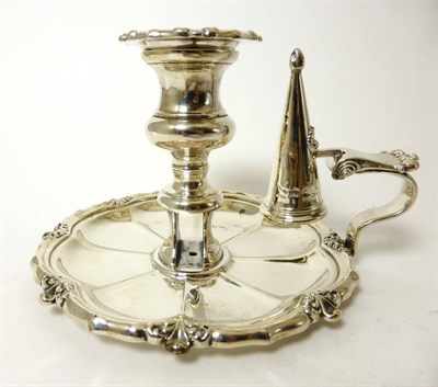 Lot 2261 - A George IV Silver Chamberstick, maker's mark worn, Sheffield 1829, with a lobed circular base,...