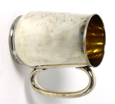 Lot 2271 - A Victorian Silver Mug, James Dixon & Sons Ltd, Sheffield 1895, the plain body with a long loop...