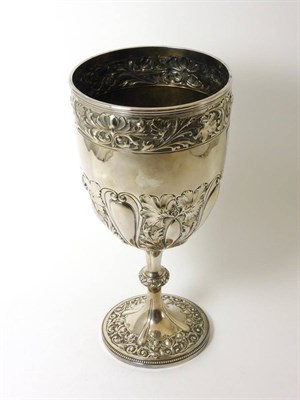 Lot 2275 - A Victorian Silver Trophy Cup, Atkin Brothers, Sheffield 1898, the body deeply chased with...