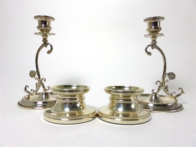 Lot 2300 - A Pair of Dwarf Silver Candlesticks, B & Co, Birmingham 2006, circular with a beaded border,...