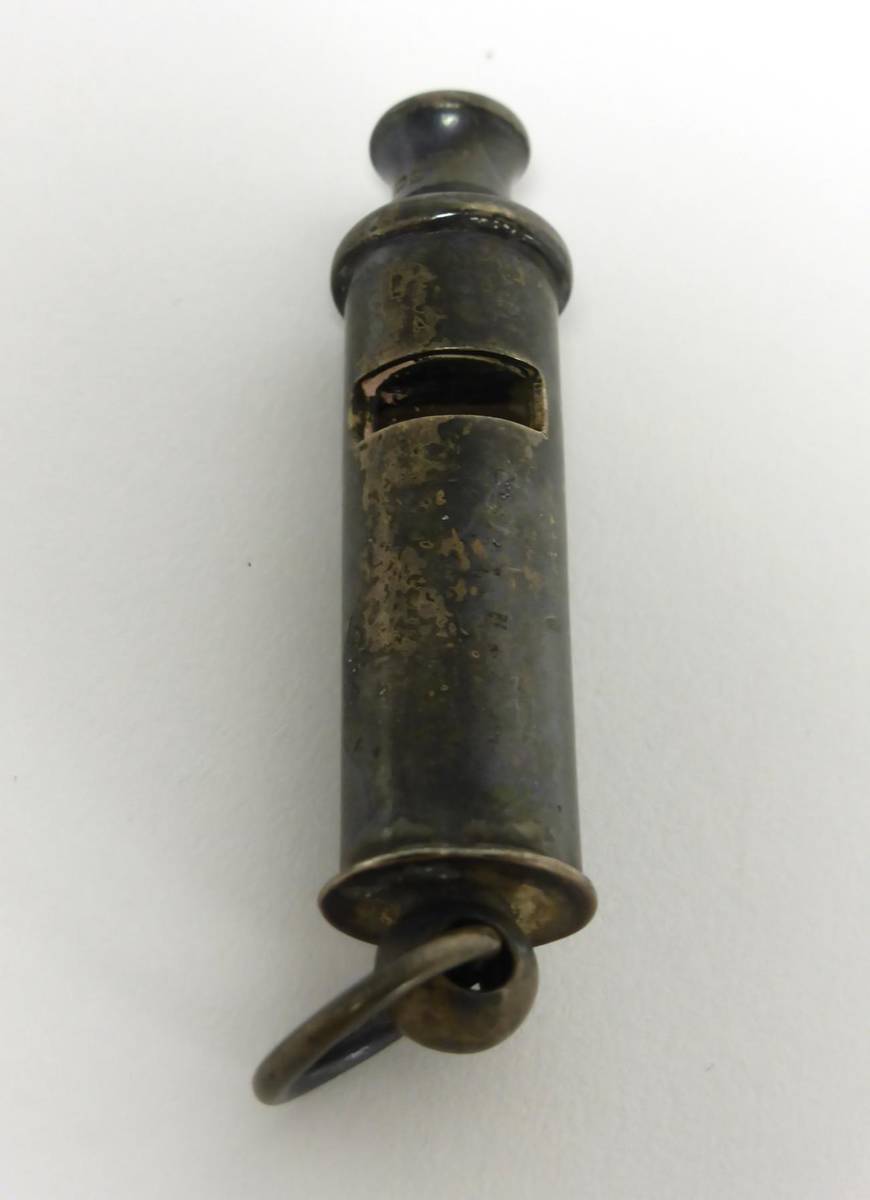 Lot 2309 - A Silver 'Policeman's Whistle', maker's mark not apparent, Birmingham 1917, of typical form,...