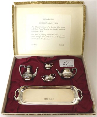 Lot 2311 - A Modern Miniature Silver Teaset, David Hollander & Son, Sheffield 1979, comprising coffee pot,...