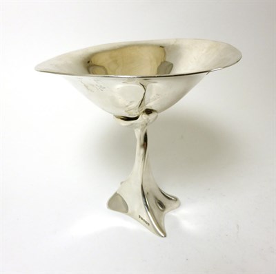 Lot 2313 - A Modern Silver Bonbon Dish, JS, Sheffield 2003, the shaped circular bowl on a twisted flowing...