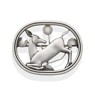 Lot 2000 - A Silver Brooch, by Georg Jensen, model number 256, formed as a kneeling deer, in an oval...