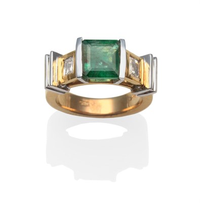 Lot 2010 - An Emerald and Diamond Ring, an emerald-cut emerald in a white half rubbed over setting, flanked by