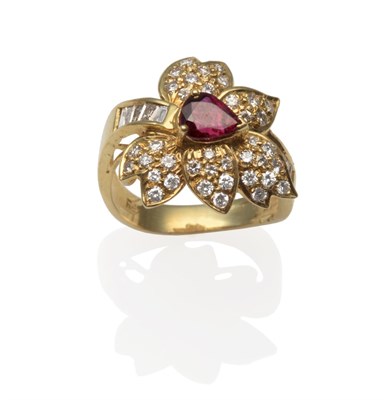 Lot 2011 - A Ruby and Diamond Leaf Motif Ring, a pear cut ruby in a yellow claw setting with pavé set...