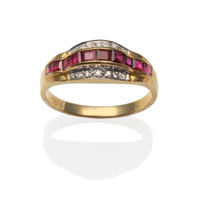 Lot 2020 - A Ruby and Diamond Ring, calibré cut rubies in yellow channel settings, within a border of...