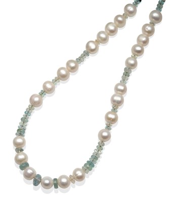 Lot 2023 - A Cultured Pearl and Aquamarine Bead Necklace, graduated round cultured pearls spaced by groups of