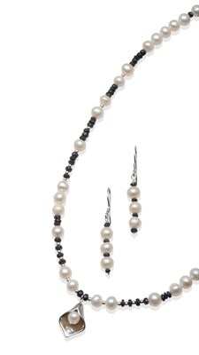 Lot 2028 - A Cultured Pearl and Sapphire Bead Necklace and Earring Suite, round cultured pearls spaced by...