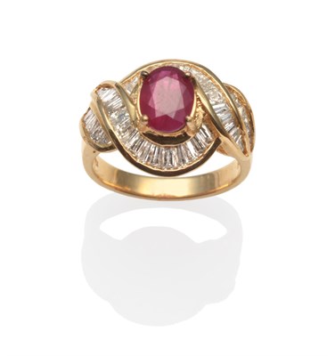 Lot 2044 - A Ruby and Diamond Ring, an oval cut ruby in a yellow claw setting within a scrolling border of...