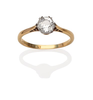 Lot 2060 - A Diamond Solitaire Ring, an old cut diamond in a white double six claw setting, on a yellow...