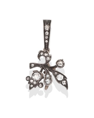 Lot 2063 - A Diamond Pendant, a leaf motif drop set throughout with old cut and rose cut diamonds in white...