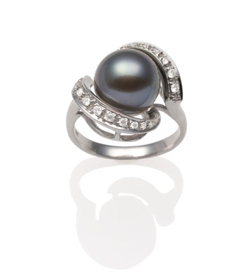 Lot 2071 - A South Sea Pearl and Diamond Cross-Over Ring, a black cultured pearl within white pavé set...