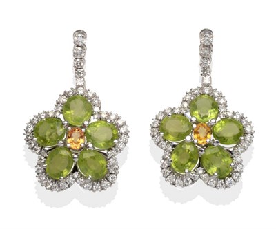 Lot 2078 - A Pair of 18 Carat White Gold Peridot, Yellow Sapphire and Diamond Earrings, an articulated bar...