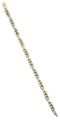 Lot 2081 - An Emerald and Diamond Bracelet, with pairs of calibré cut emeralds in yellow rubbed over settings