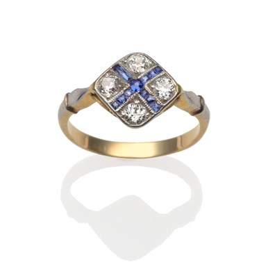 Lot 2099 - A Diamond and Sapphire Cluster Ring, with four old cut diamonds and calibré cut sapphires in white