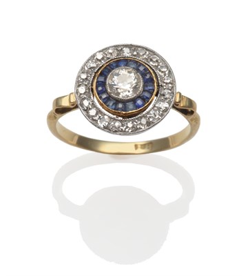 Lot 2100 - A Sapphire and Diamond Cluster Ring, a central old cut diamond in a white millegrain setting,...