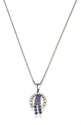 Lot 2103 - An 18 Carat White Gold Sapphire and Diamond Pendant, a half hoop of round brilliant cut...