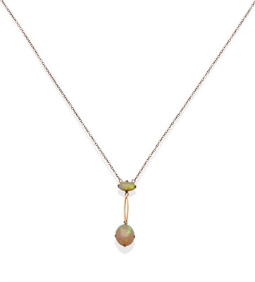 Lot 2112 - An Early 20th Century Opal Necklace, an oval cabochon opal suspends a split bar to a larger...