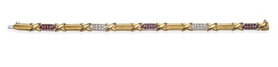 Lot 2117 - A Ruby and Diamond Bracelet, alternating white bar links claw set with round brilliant cut diamonds