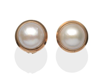 Lot 2118 - A Pair of Mabe Pearl Earrings, a large mabe pearl in yellow bezel setting with rope pattern border