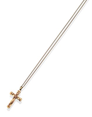 Lot 2120 - A Welsh Cross on Chain, by Clogau, a yellow cross overlaid with a rose coloured leaf motif, on...