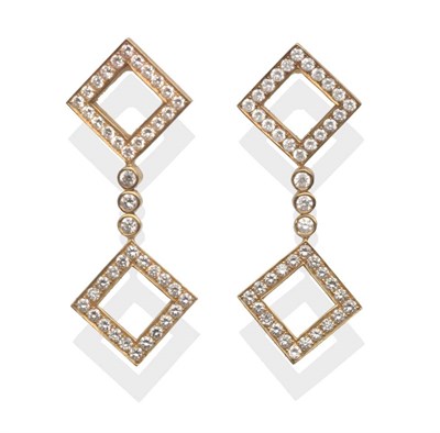 Lot 2147 - A Pair of Diamond Set Drop Earrings, two open squares channel set with round brilliant cut...