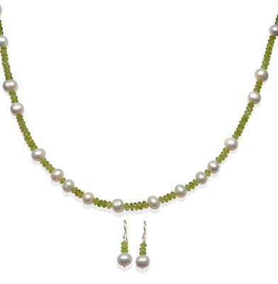 Lot 2163 - A Cultured Pearl and Peridot Bead Necklace and Earring Suite, round cultured pearls spaced by...