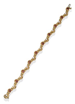 Lot 2192 - A Ruby and Diamond Bracelet, with alternating round brilliant cut diamonds and round cut rubies...